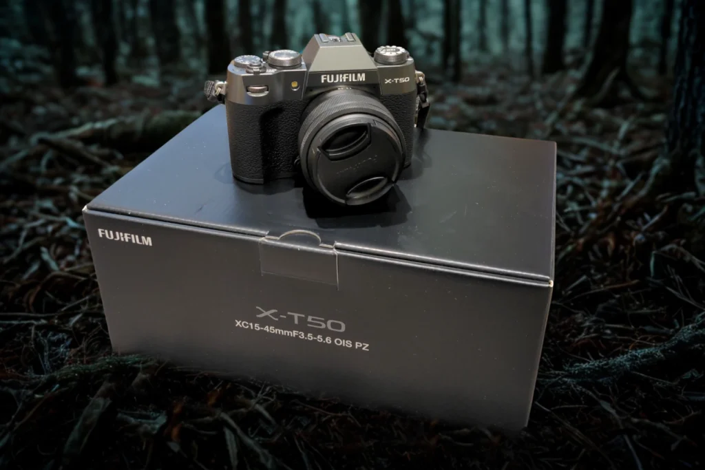 FujiFilm X-T50 and 15–45mm Lens sitting on the box the camera and lens came in